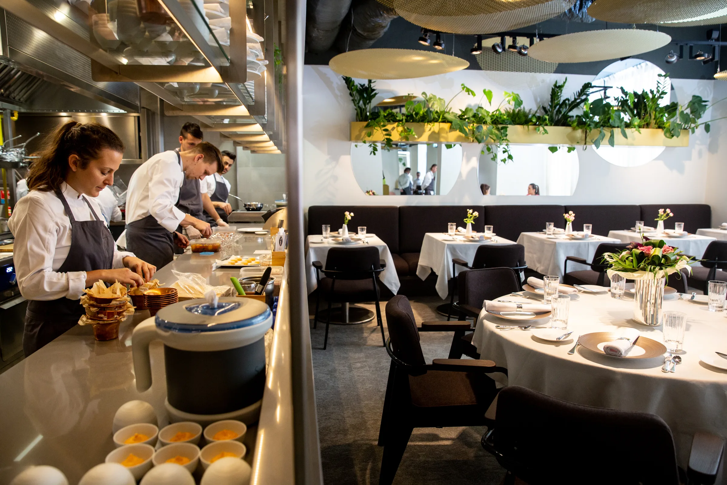 Stand Restaurant Budapest- the glass-walled show kitchen with the chef's brigade at work
