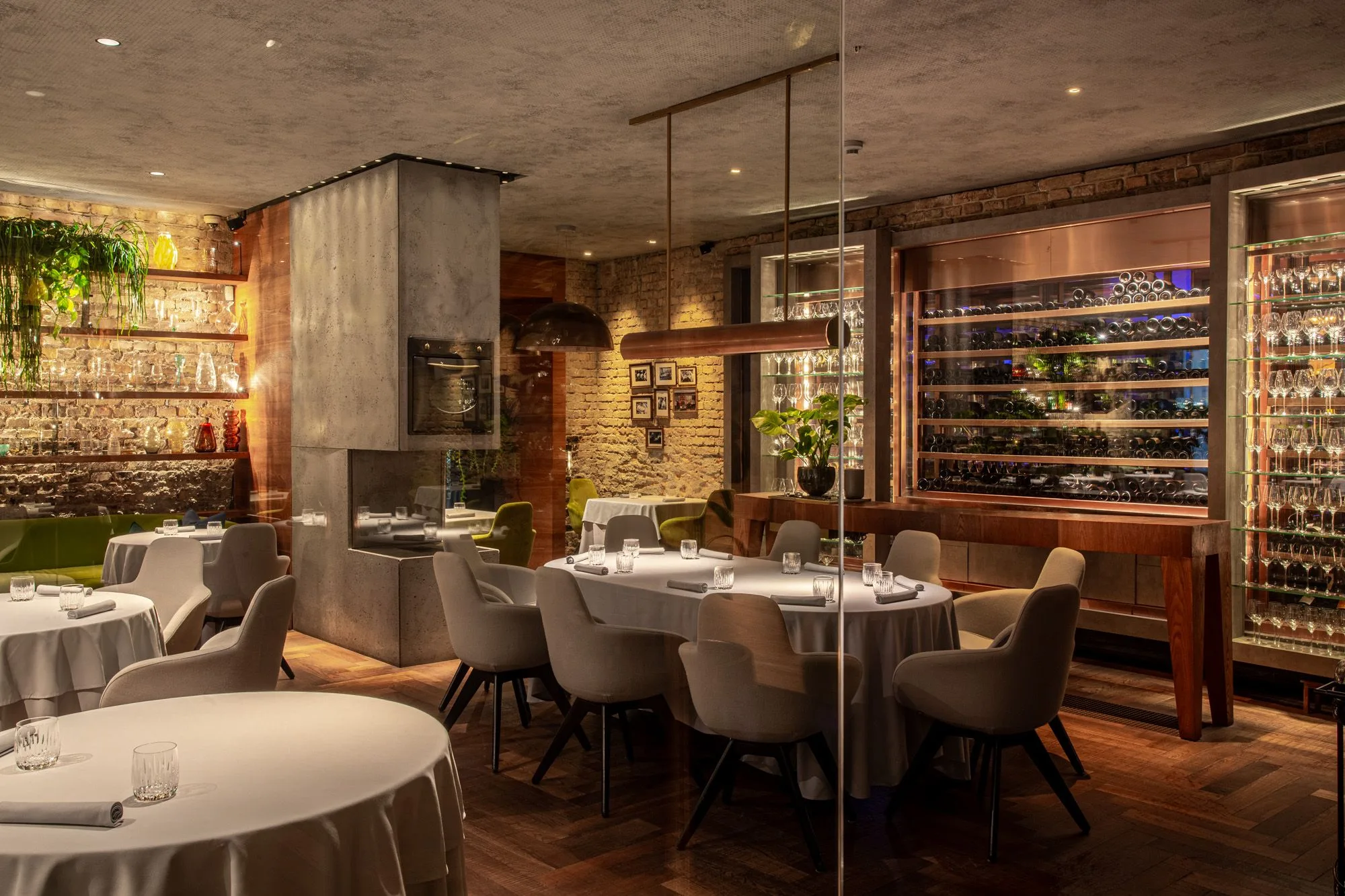 Babel Budapest- the atmospheric dining room with original 1838 flood watermarks on the stone walls